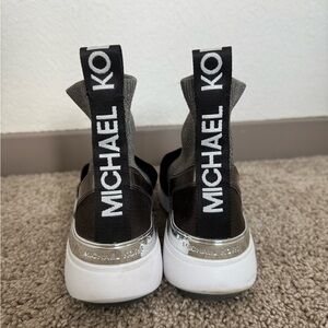 Michael Kors Knit Slip On Sneakers in Black, Silver, and White
